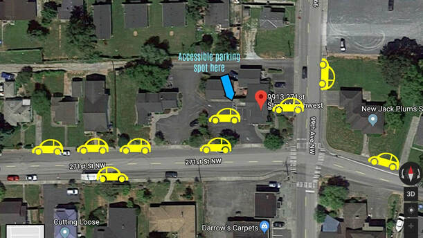 Photo illustration with yellow cars marking available parking for the shop, plus accessible parking